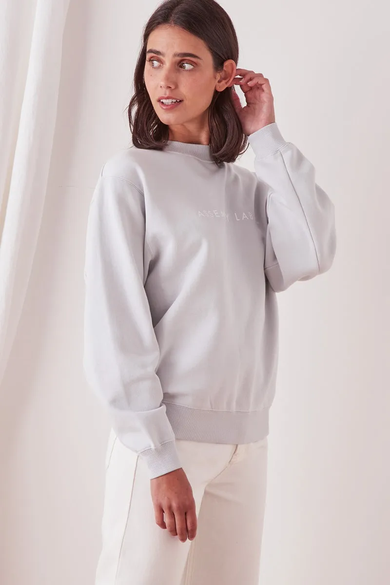 Assembly Label - The Logo Fleece - Seamist
